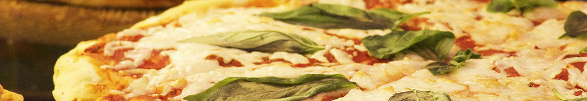 Eating Italian Pizza at Carsonie's Stromboli & Pizza restaurant in Columbus, OH.